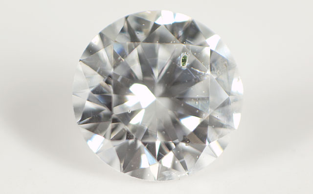 天然グリーンダイオプサイドと思われる結晶入りダイヤモンド画像