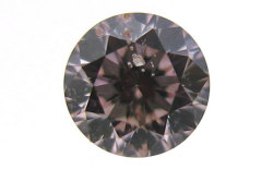 天然ガーネットと思われる結晶入りピンクダイヤモンドルース画像