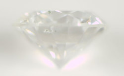 天然グリーンダイオプサイドと思われる結晶入りダイヤモンドルース画像